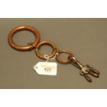 3 copper bull rings. stamped "Hiatts Wrought", diameters 6.5 cm, 4.5 cm and 3.5 cm, and pig ring