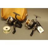 2 J.W. Young Ambidex Match reels with one leatherette pouch.