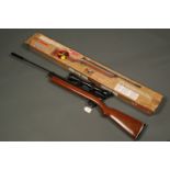 Crosman 2260 CO2 bolt action air rifle fitted with Optalens Initial 6 x 40 telescopic sight.