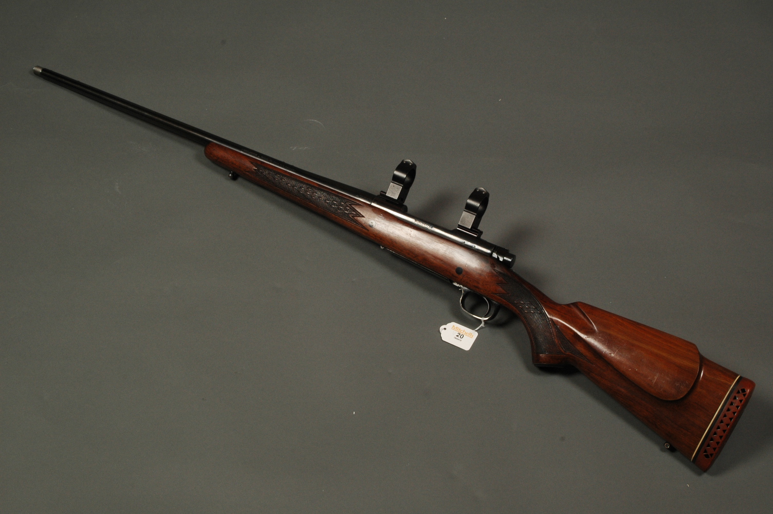 Winchester Model 70 bolt action rifle, 7 mm Remington magnum, 30 mm mounts, screw cut.  Serial No.