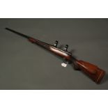 Winchester Model 70 bolt action rifle, 7 mm Remington magnum, 30 mm mounts, screw cut.  Serial No.