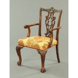 An Edwardian mahogany armchair, in the Chippendale style,