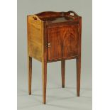 A George III mahogany bedside cabinet, with tray type fixed top,