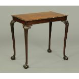 A mahogany gadrooned edge top side table, raised on carved cabriole legs.