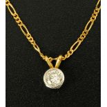 An 18 ct yellow gold diamond set pendant, diamond weight .63 carats.