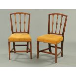 A pair of George III mahogany Hepplewhite style dining chairs,