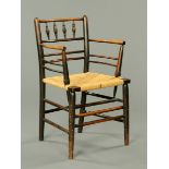 A 19th century ash spindle backed armchair,