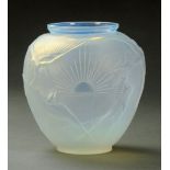 A Sabino Art Deco opalescent glass vase, moulded with sunrise and swallows, signed "Sabino, France".