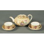 A 19th century Russian teapot, two cups and two saucers, one cup bearing label "Popov 1860".