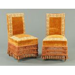 A pair of Victorian upholstered side chairs, with turned front legs.