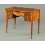 An Edwardian inlaid rosewood desk, with red leather writing surface,