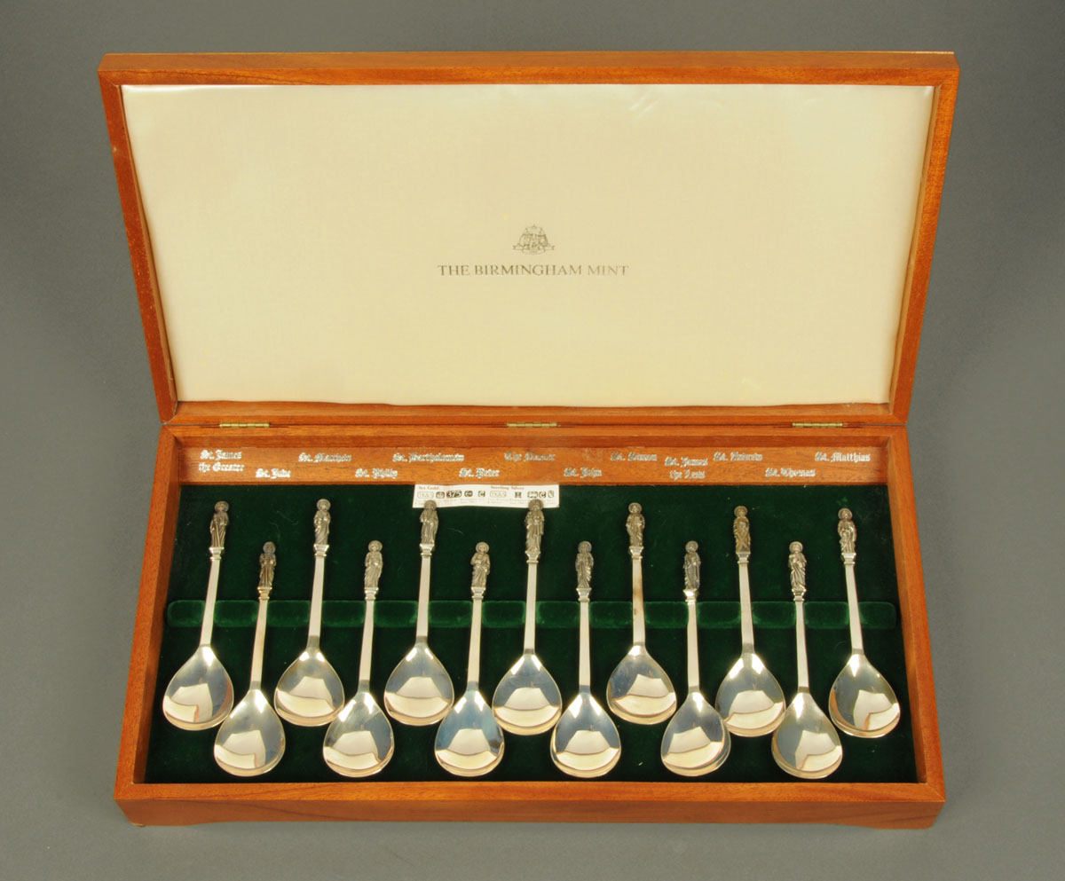 A cased set of thirteen Apostle spoons, each with titled Apostle, 667/1000 The Birmingham Mint 1976.