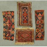 * Four small Afghan rugs, two Caucasian, one Turkomen and another.  Longest 108 cm. CONDITION