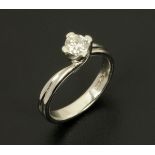 A white gold solitaire diamond ring, four claw set, size I.