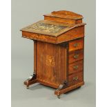 A late Victorian/Edwardian rosewood Davenport, with rear stationery compartment,