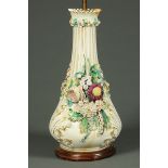 A large Continental porcelain floral encrusted lamp base.  Height excluding light fitting 49 cm.