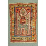 * A North East Turkey Caucasian rug, with rectangular centre panel with turquoise ground and