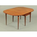 A George III mahogany twin drop flap dining table,