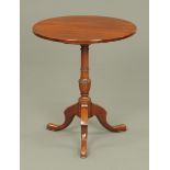 A Victorian mahogany circular tripod table,