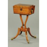 A Regency mahogany sewing box, with ebonised stringing, brass drop carrying handles with lion mask