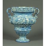 * An Italian Cantagalli Majolica two handled pedestal vase, in 17th century style,