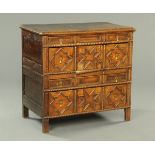 A Jacobean oak two part chest of drawers,