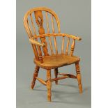 A 19th century child's Windsor armchair, with pierced splat back,