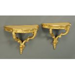 A pair of late Victorian giltwood console tables, recently repainted.  Width 82 cm.