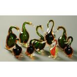 A collection of nine Italian hand blown glass swans, probably Murano.  Tallest 18 cm.