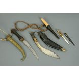 A Jambiya dagger, Kukri knife, hunting knife and small stag horn handled knife.