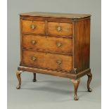 A Queen Anne style walnut chest,