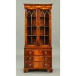 A mahogany reproduction bookcase,