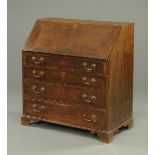 A George III oak bureau,