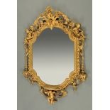 A 19th century giltwood and gesso mirror, in the Rococo style and with cherub to either side.