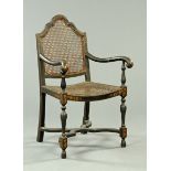 An Edwardian painted wooden Bergere armchair,