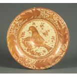 * A Hispano-Moresque lustre pottery shallow circular dish, probably Valencia, 18th century,