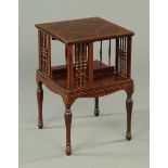 * An Edwardian inlaid mahogany square revolving bookcase, raised on a table type base.  Width 46 cm.