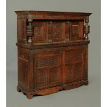 An antique oak court cupboard,