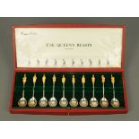 The Queens Beasts ten parcel gilt silver spoons, each with heraldic terminal,