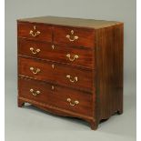 A George III mahogany chest of drawers,