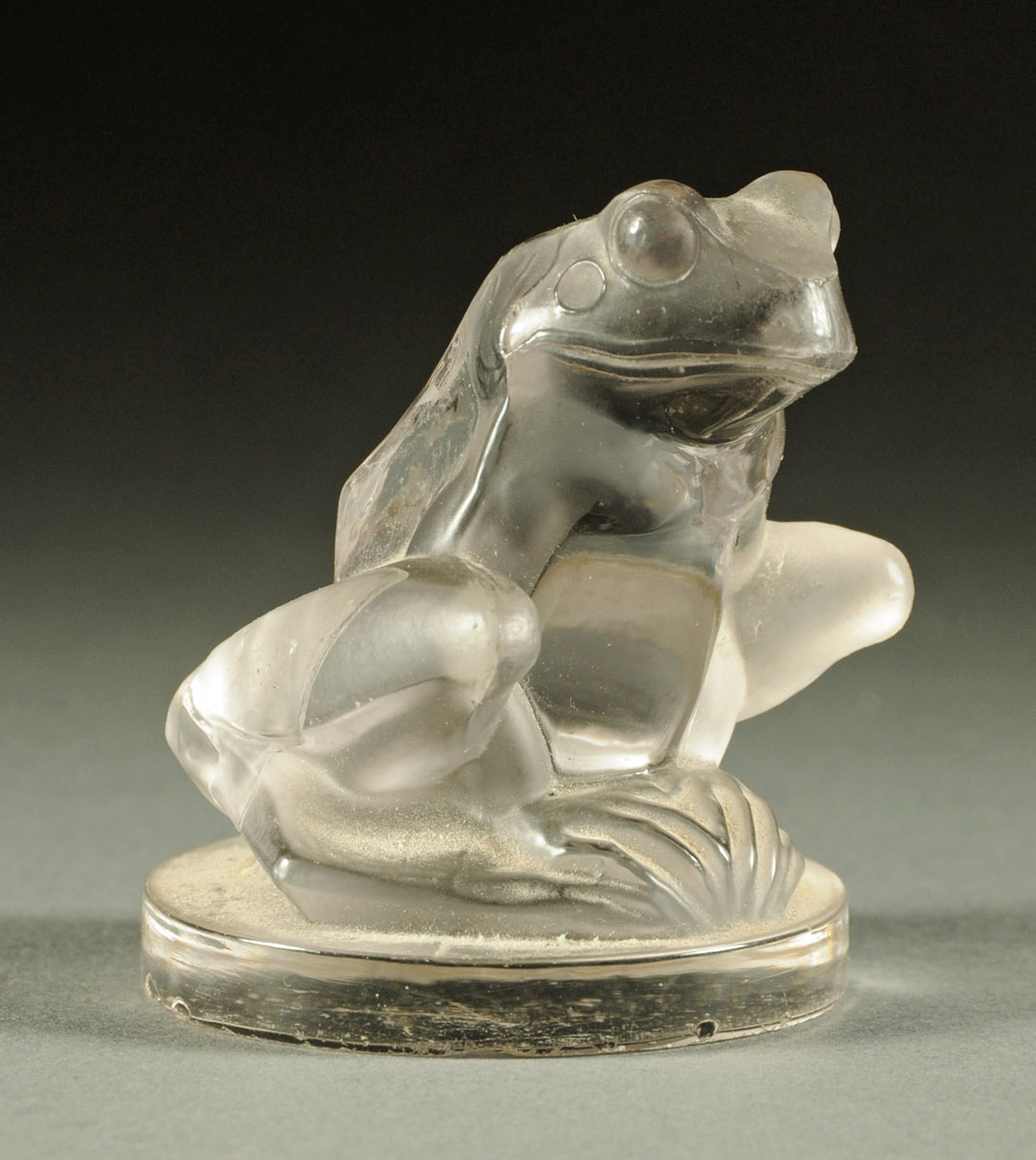 A Lalique glass car mascot in the form of a grenouille, signed "R. Lalique, France" in script to