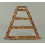 A late 19th century Continental carved wooden wall mounting shelf, triangular form.  Width 80 cm.