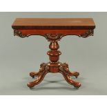 * A late William IV/early Victorian mahogany turnover top rectangular tea table, with turned column,