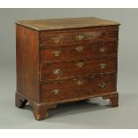 A George III oak chest of drawers,