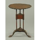 An Edwardian mahogany tripod table, in the Chippendale style, with piecrust moulded edge,