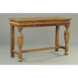 A Victorian oak hall table, with carved frieze fitted with a single drawer,