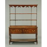 A George III oak Delft rack,