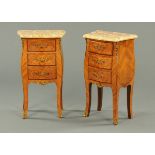 A pair of Continental walnut veneered bombe three drawer chests,