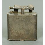 A Dunhill type silver cigarette lighter, London 1923.  Width 5 cm, CONDITION REPORT: The date letter