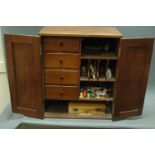 Edwardian mahogany cabinet, with fitted interior filled with fly tying vice, tools, hackles,